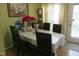 Inviting dining area with seating for six, natural light, and stylish decor at 4245 Toccopola St, Raleigh, NC 27604