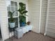 The home's quaint patio provides a place for potted plants at 4245 Toccopola St, Raleigh, NC 27604