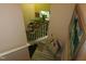 A welcoming staircase with a charming decorative art and plants at 4245 Toccopola St, Raleigh, NC 27604