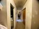 Hallway in need of paint and cleaning at 4308 Old Chapel Hill Rd Rd, Durham, NC 27707