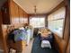 Spacious laundry room filled with natural light and washer/dryer hookups at 4308 Old Chapel Hill Rd Rd, Durham, NC 27707