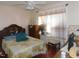 Bedroom with ceiling fan, hardwood floors, and ample natural light at 468 Dickens Dr, Raleigh, NC 27610