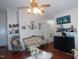 Living room boasts fan and mantel at 468 Dickens Dr, Raleigh, NC 27610