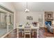 Dining area next to the living room features access to the screened porch at 580 Long View Dr, Youngsville, NC 27596