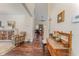 Inviting foyer with hardwood floors and decorative furnishings leads to the living area at 580 Long View Dr, Youngsville, NC 27596