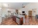 Open concept kitchen with granite island and stainless appliances at 580 Long View Dr, Youngsville, NC 27596