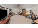 Large living room featuring a recliner, futon, storage and natural light at 580 Long View Dr, Youngsville, NC 27596
