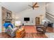 Spacious living room with high ceilings, stone fireplace, and a cozy seating arrangement at 580 Long View Dr, Youngsville, NC 27596