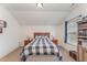Bedroom featuring a bed, side tables, storage and a window with light at 580 Long View Dr, Youngsville, NC 27596