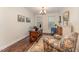 Office space with wood floors, desk, art and a comfortable chair with an oriental rug at 580 Long View Dr, Youngsville, NC 27596
