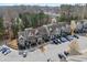 An aerial view of the townhome community showcasing ample parking and well-maintained landscaping at 6233 Pesta Ct, Raleigh, NC 27612