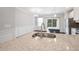 Kitchen view highlighting the large island, stainless steel sink, and modern finishes at 6233 Pesta Ct, Raleigh, NC 27612