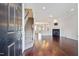 Inviting open-concept with hardwood floors, a fireplace, and staircase at 6233 Pesta Ct, Raleigh, NC 27612