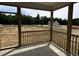 Relaxing screened back porch area with views of the community at 704 Compeer Way # 28, Rolesville, NC 27571