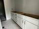 New bathroom vanity with white cabinets and sleek black hardware at 704 Compeer Way # 28, Rolesville, NC 27571