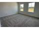Bright bedroom with two windows offering lovely views, perfect for relaxation at 704 Compeer Way # 28, Rolesville, NC 27571