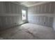 Cozy bedroom with natural light streaming through a window at 704 Compeer Way # 28, Rolesville, NC 27571
