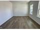 Bright bedroom with lots of natural light from two windows and luxury vinyl flooring at 704 Compeer Way # 28, Rolesville, NC 27571