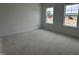 Unfinished bedroom with white walls and two large windows providing natural light at 704 Compeer Way # 28, Rolesville, NC 27571
