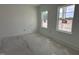 Bedroom with two windows letting in natural light at 704 Compeer Way # 28, Rolesville, NC 27571
