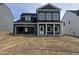 Charming two-story home with white trim and an attached two-car garage at 704 Compeer Way # 28, Rolesville, NC 27571