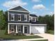 Charming two-story home with a welcoming front porch and attached garage at 704 Compeer Way # 28, Rolesville, NC 27571