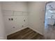 Convenient laundry room features shelving and hookups for a washer and dryer at 704 Compeer Way # 28, Rolesville, NC 27571