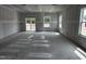 Bright, unfinished living room with access to a deck and natural light at 704 Compeer Way # 28, Rolesville, NC 27571