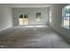 Living room with sliding glass door leading to the backyard at 704 Compeer Way # 28, Rolesville, NC 27571
