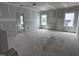 Bright living room with large windows offering natural light and views at 704 Compeer Way # 28, Rolesville, NC 27571