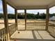 Covered porch offering great space and views for outdoor relaxation and entertainment at 704 Compeer Way # 28, Rolesville, NC 27571