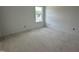 Well-lit room featuring a large window for natural light at 704 Compeer Way # 28, Rolesville, NC 27571