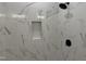 Modern shower featuring white tile walls with a built-in niche and black fixtures at 704 Compeer Way # 28, Rolesville, NC 27571