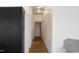 Hallway featuring modern lighting fixtures and wood flooring at 735 Alexander Ave, Henderson, NC 27536