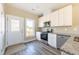 Contemporary kitchen with stainless steel appliances and access to the outside at 818 E Holly St, Rocky Mount, NC 27801