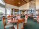 Spacious dining room with stone fireplace, perfect for entertaining guests and enjoying meals at 829 Chapel Ridge Dr, Pittsboro, NC 27312