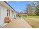 Inviting backyard featuring a patio area with outdoor seating, perfect for relaxing and entertaining at 928 Hanford Rd, Graham, NC 27253