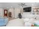 Comfortable living room with custom built-ins, a large screen TV, and stylish seating arrangements at 928 Hanford Rd, Graham, NC 27253