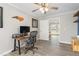 Office showcases a functional workspace, ceiling fan and neutral decor creating a productive atmosphere at 928 Hanford Rd, Graham, NC 27253