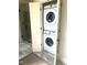 Bathroom featuring a stacked washer and dryer at 100 High Ridge Ln, Pittsboro, NC 27312