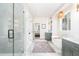 Open bathroom with tub, sinks, and modern fixtures at 100 High Ridge Ln, Pittsboro, NC 27312
