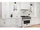 Well-equipped kitchen with modern appliances, granite countertops, and ample cabinet space at 100 High Ridge Ln, Pittsboro, NC 27312