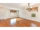 Inviting living room with hardwood floors, neutral walls, and natural light at 1009 Limeberry Ct, Clayton, NC 27520