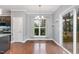 Inviting dining area with hardwood floors, natural light, and seamless transition to the outdoor deck at 101 Lager Ln, Garner, NC 27529
