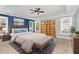 This stylish main bedroom boasts great natural light, trey ceiling, and a beautiful rug at 101 Lager Ln, Garner, NC 27529