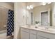 Bathroom featuring a double vanity, tile flooring, and a bathtub with a decorative shower curtain at 101 Redfoot Run Rd, Chapel Hill, NC 27516