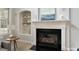 Close-up showcasing the fireplace with white mantle and decorative built in bookshelves at 101 Redfoot Run Rd, Chapel Hill, NC 27516