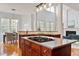 Gourmet kitchen featuring a large island, stainless steel appliances, and an open layout at 101 Redfoot Run Rd, Chapel Hill, NC 27516