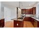 Modern kitchen showcasing granite countertops, stainless steel appliances, and a central island at 101 Redfoot Run Rd, Chapel Hill, NC 27516