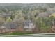 Expansive home nestled among trees offering privacy and seclusion, perfect for tranquil living at 104 Sierra Dr, Chapel Hill, NC 27514